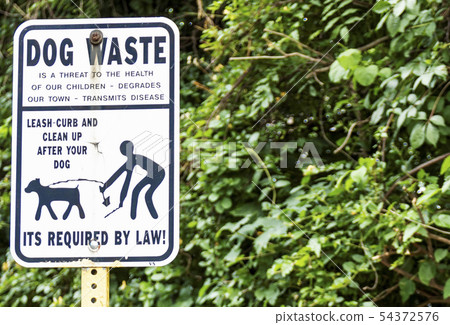 Dlean up after your dog street sign 54372576