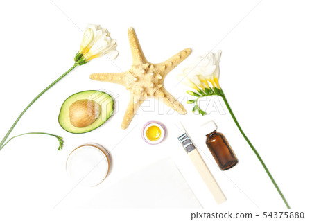 Beauty DIY SPA sauna concept with avocado, skin care facial essence oil, brush, flower and towel on 54375880