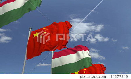 Row of waving flags of Hungary and China, 3D rendering Row of waving flags of Hungary and China, 3D rendering 54377849