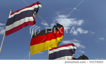 Flags of Thailand and Germany against blue sky, 3D rendering Flags of Thailand and Germany against blue sky, 3D rendering 54378985