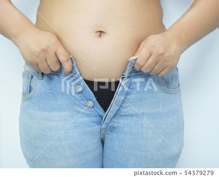 Asian women are overweight. She has excess fat aro Asian women are overweight. She has excess fat aro 54379279