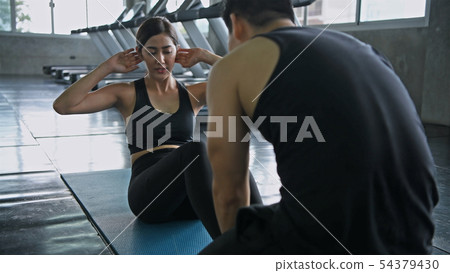 Exercise concept. Women are exercising by sit up Exercise concept. Women are exercising by sit up 54379430