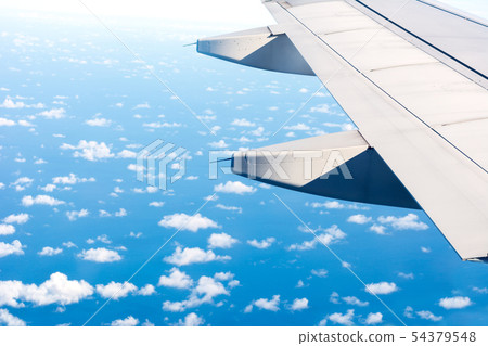 Airline Wing over sky cloud and blue ocean.  54379548