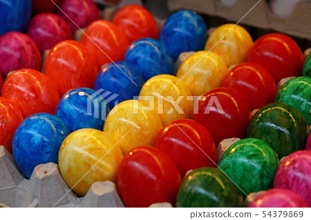 Close up painted Easter eggs in tray carton Close up painted Easter eggs in tray carton 54379869