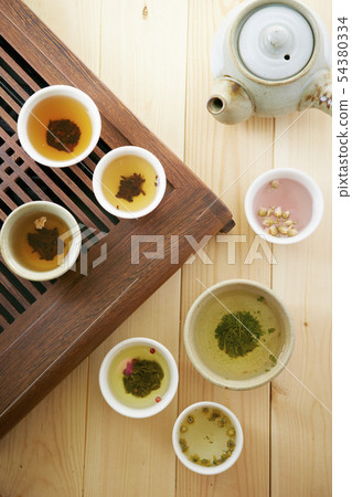 Colorful Chinese tea and teacup Colorful Chinese tea and teacup 54380334