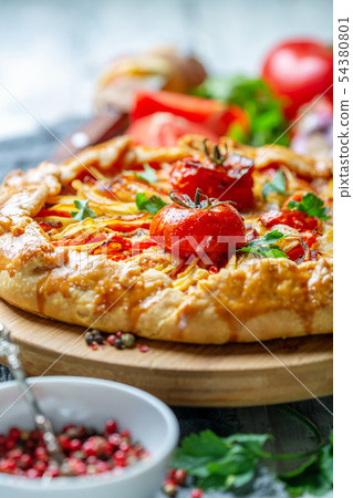 Homemade open pie (Galette) with potatoes. Homemade open pie (Galette) with potatoes. 54380801