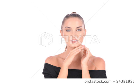 Beauty concept. A beautiful girl is fondling her Beauty concept. A beautiful girl is fondling her 54381955