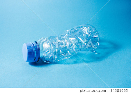 Disposable plastic bottle on blue background. 54381965