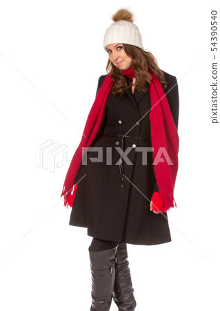 Beautiful young woman in black coat with white hat. Beautiful young woman in black coat with white hat. 54390540