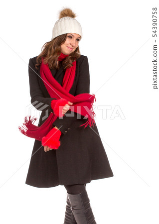 Beautiful young woman in black coat with white hat. Beautiful young woman in black coat with white hat. 54390758