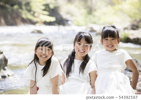 River and girls summer image River and girls summer image 54392587