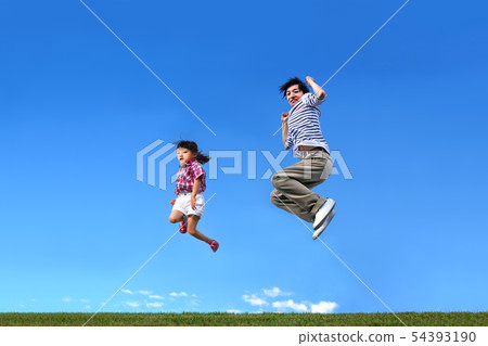 Parents and children jumping together against a background of blue sky. Jealousy, loving, happy, leap, future image Parents and children jumping together against a background of blue sky. Jealousy, loving, happy, leap, future image 54393190