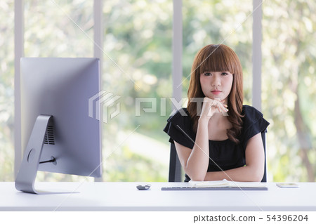 Young lady in black dress Young lady in black dress 54396204