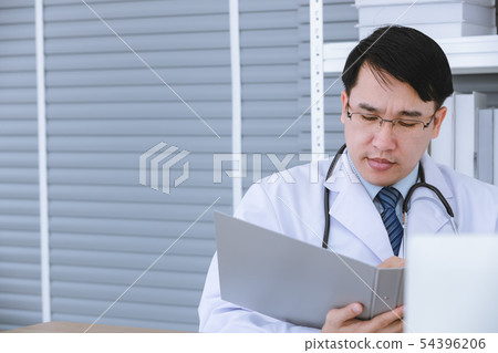 Male doctor sit on wheelchair. Male doctor sit on wheelchair. 54396206