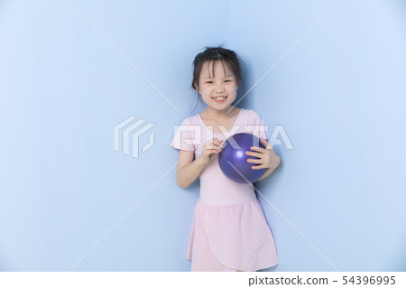 Asian girl stands and holding gymnastic hoop.. Asian girl stands and holding gymnastic hoop.. 54396995