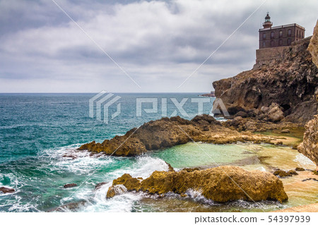 Lighthouse in harbor Melilla. Lighthouse in harbor Melilla. 54397939