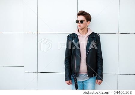Handsome young man in sunglasses  54401168