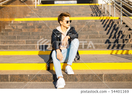 Handsome fashionable young man  54401169