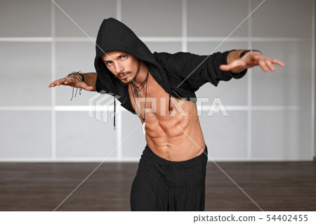 Fashionable handsome male dancer dancing Fashionable handsome male dancer dancing 54402455