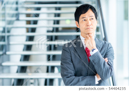 Middle businessman Middle businessman 54404235