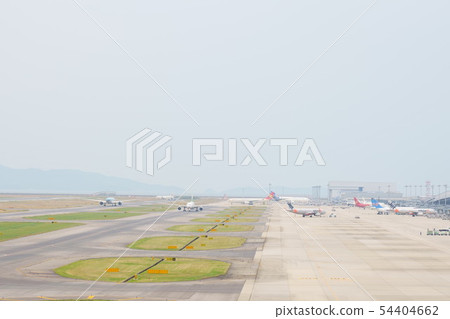 Airplanes crossing the runway 54404662