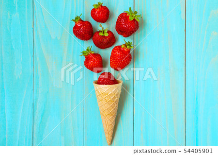 Waffle cone with fresh strawberries Waffle cone with fresh strawberries 54405901