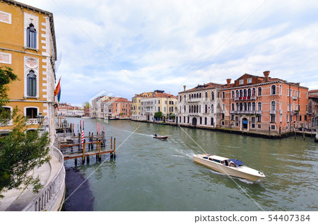 Motor boat in Grand Canal waters of Venice. Motor boat in Grand Canal waters of Venice. 54407384