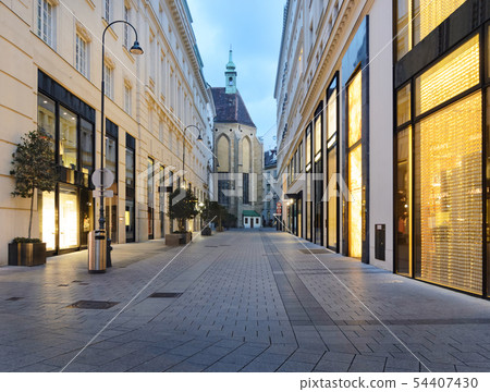 Colorful street with the church in Vienna, Austria Colorful street with the church in Vienna, Austria 54407430