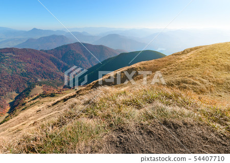 grass slope of the mountain in The Vratna valley. grass slope of the mountain in The Vratna valley. 54407710