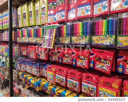 Stationery is packed and hung on display racks 54408323