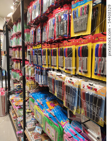 Stationery is packed and hung on display racks 54408329