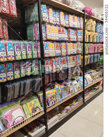 Stationery is packed and hung on display racks 54408332