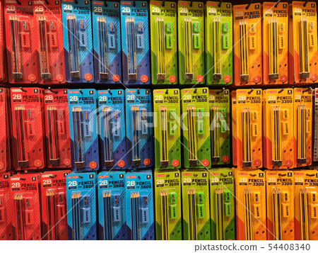 Stationery is packed and hung on display racks 54408340