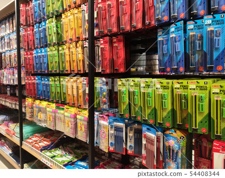 Stationery is packed and hung on display racks 54408344