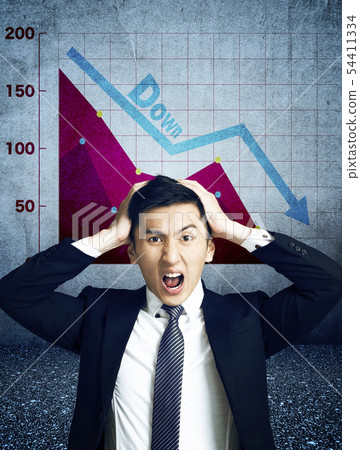 angry businessman watching graph heading down angry businessman watching graph heading down 54411334