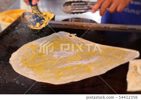 Making of dessert sweet roti 54412356