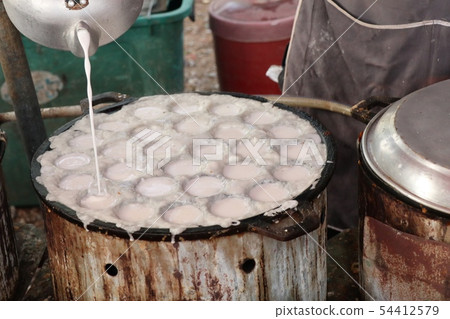 Coconut milk mix sugar and flour 54412579