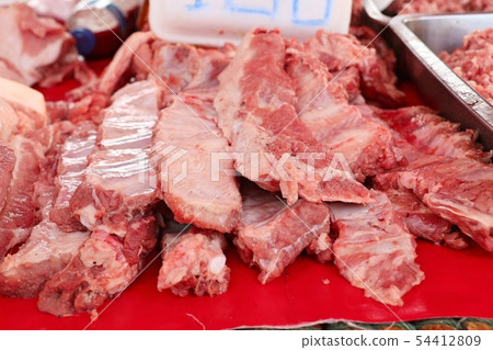 fresh pork meat in market 54412809