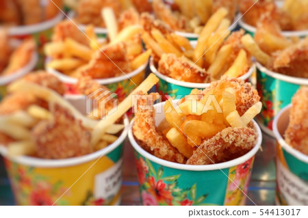 French fries and fried chicken at market 54413017