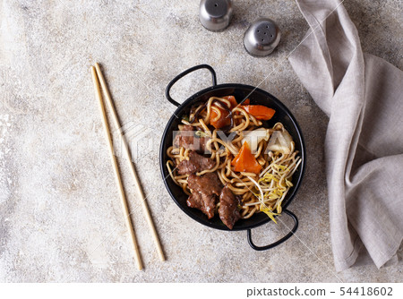 Asian noodles with meat and vegetables Asian noodles with meat and vegetables 54418602