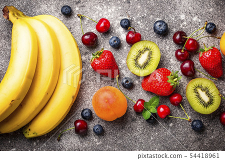 Fruits and berries summer background Fruits and berries summer background 54418961