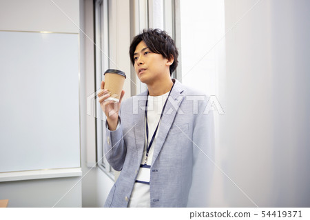 Annoyed young male employee breather image Annoyed young male employee breather image 54419371