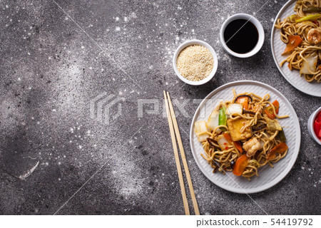 Asian noodles with shrimps and vegetables Asian noodles with shrimps and vegetables 54419792