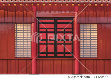 A close-up of the glazed wall and shoji of Shuri Castle in Okinawa 54420466