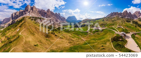 Dolomites - Beautiful panoramic sunset landscape at Gardena Pass (Passo Giau) near Ortisei. Stunning 54423069