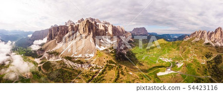Dolomites - Beautiful panoramic sunset landscape at Gardena Pass (Passo Giau) near Ortisei. Stunning 54423116