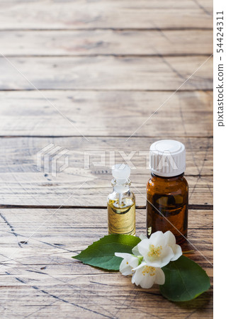 Oil of jasmine. Aromatherapy with jasmine oil.  54424311