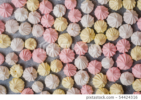 Small home meringue laid out on a gray table Small home meringue laid out on a gray table 54424316