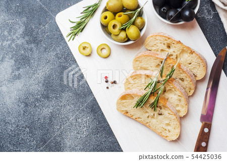 Italian ciabatta bread with olives and rosemary Italian ciabatta bread with olives and rosemary 54425036