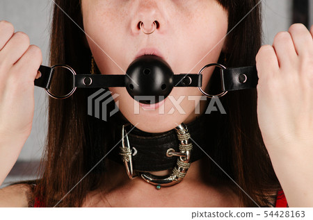 BDSM outfit for adult sex games. A young woman 54428163